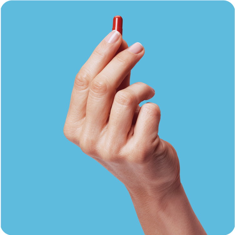 Hand holding medication, Picture